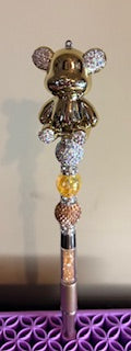 Gold bear pen with diamond rhinestones.